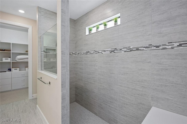 2720 Amaranda Ct, Naples, FL 34114 - bathroom featuring a tile shower