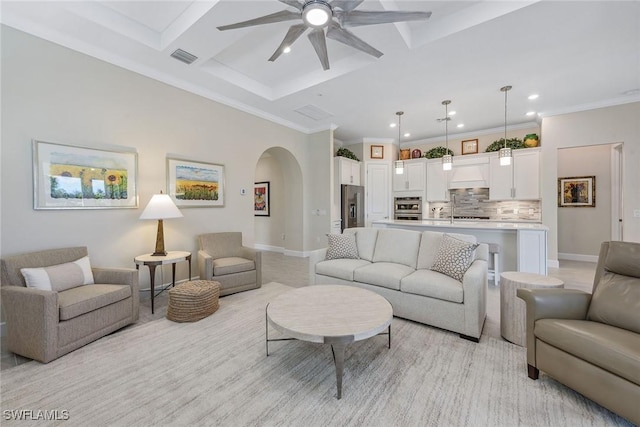 2720 Amaranda Ct, Naples, FL 34114 - living room with beamed ceiling, crown molding, coffered ceiling, and ceiling fan