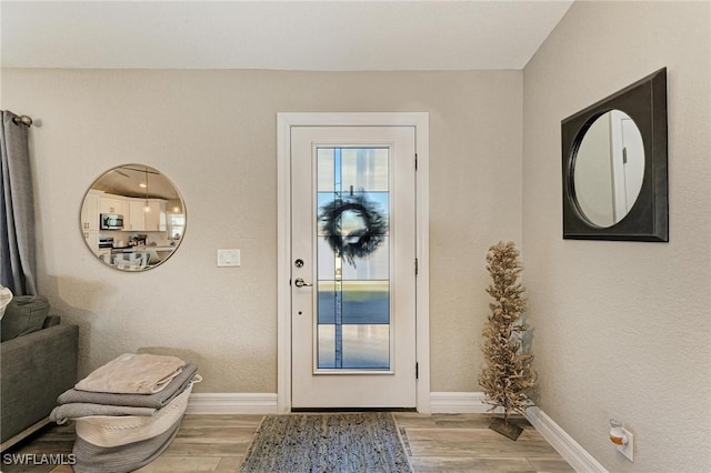 foyer featuring hardwood / wood-style flooring