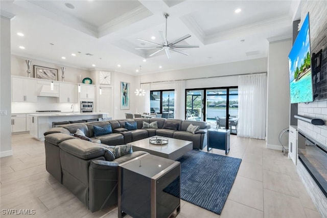 tiled living room with a fireplace, ornamental molding, and coffered ceiling