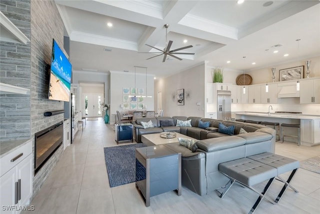 tiled living room with coffered ceiling, crown molding, beamed ceiling, and a towering ceiling