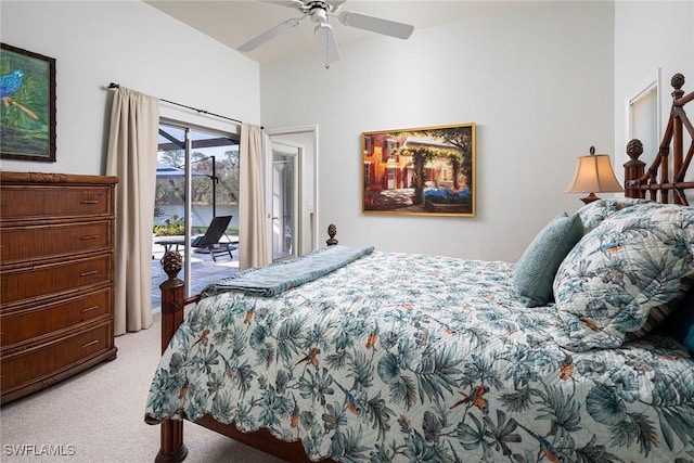 carpeted bedroom with access to outside and ceiling fan