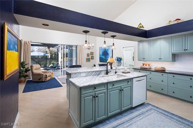 kitchen featuring sink, light stone counters, hanging light fixtures, dishwasher, and an island with sink