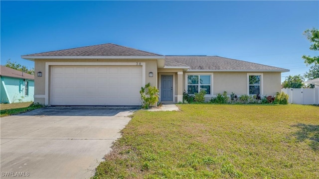 ranch-style house with a garage and a front yard