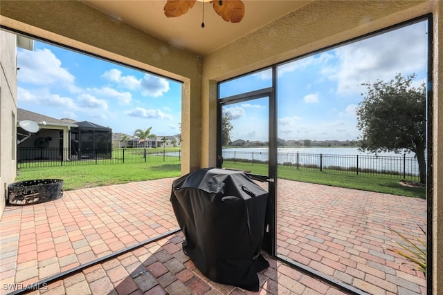 2628 Manzilla Ln, Cape Coral, FL 33909 - sunroom / solarium with a water view and ceiling fan
