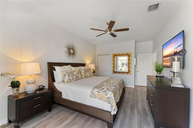 bedroom featuring ceiling fan and light hardwood / wood-style floors