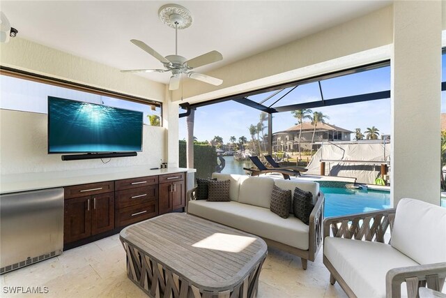 living room featuring ceiling fan
