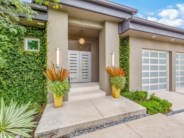 property entrance with a garage