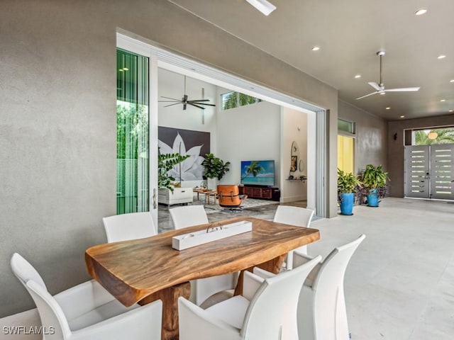 dining room with a healthy amount of sunlight and ceiling fan