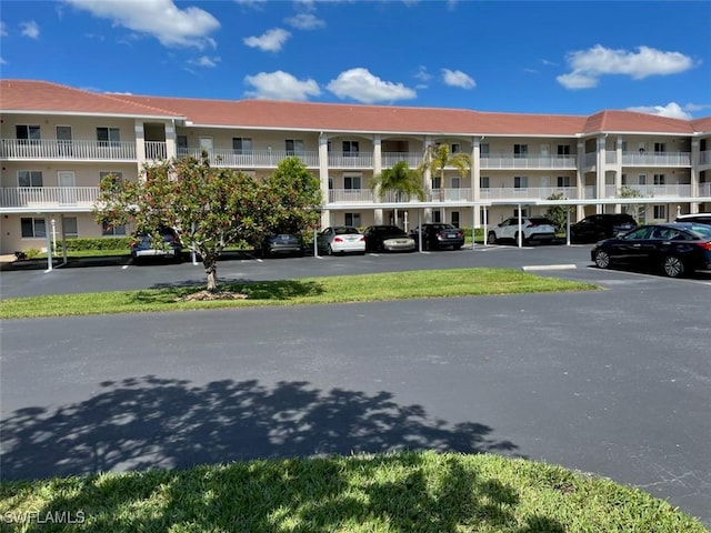 view of property with covered parking