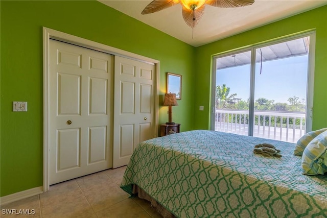 621 Rum Rd, Captiva, FL 33924 - bedroom with access to outside, light tile patterned floors, baseboards, a closet, and ceiling fan