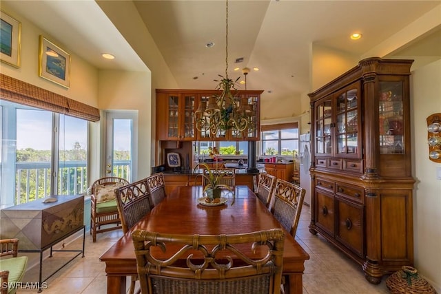 621 Rum Rd, Captiva, FL 33924 - dining room with light tile patterned floors, recessed lighting, and high vaulted ceiling