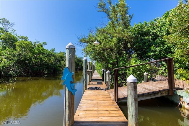 621 Rum Rd, Captiva, FL 33924 - dock area featuring a water view