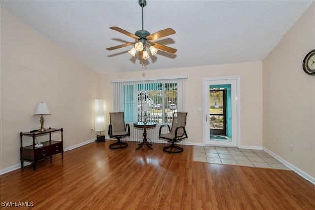 4001 E Sunflower Cir, Labelle, FL 33935 - living area featuring baseboards, wood finished floors, and a ceiling fan