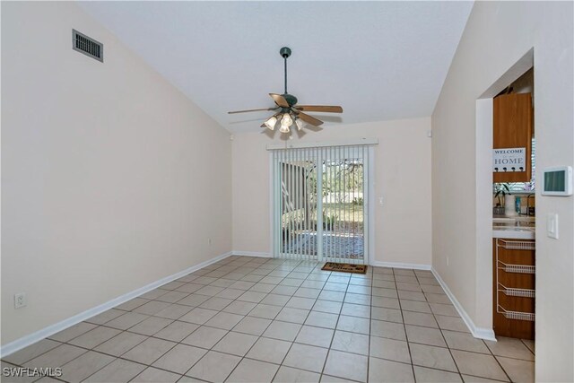 4001 E Sunflower Cir, Labelle, FL 33935 - unfurnished room featuring baseboards, visible vents, light tile patterned floors, and a ceiling fan