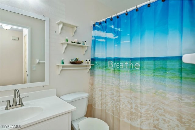 4001 E Sunflower Cir, Labelle, FL 33935 - bathroom featuring toilet, vanity, and a shower with shower curtain