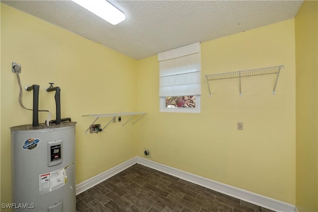 4001 E Sunflower Cir, Labelle, FL 33935 - laundry area featuring baseboards, laundry area, dark wood-type flooring, hookup for an electric dryer, and electric water heater