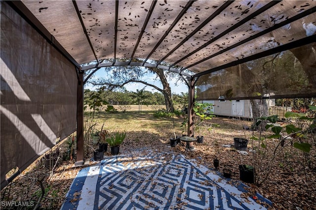 4001 E Sunflower Cir, Labelle, FL 33935 - view of patio / terrace with an outbuilding and a pergola