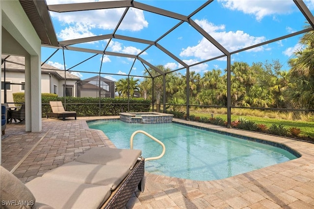 view of pool featuring an in ground hot tub, a lanai, and a patio area