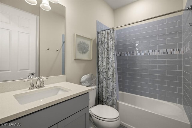 full bathroom featuring shower / tub combo, vanity, and toilet