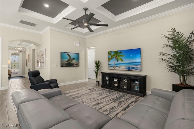 living room featuring coffered ceiling, ornamental molding, ceiling fan, beam ceiling, and a high ceiling