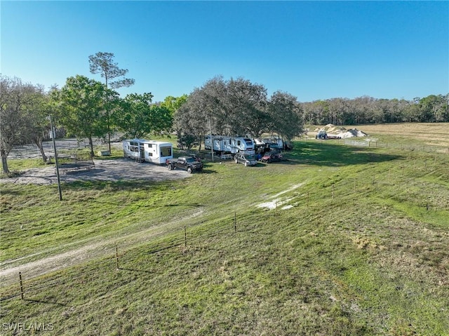 view of yard with a rural view