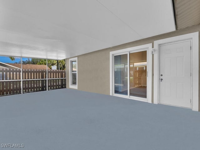 view of patio / terrace featuring fence