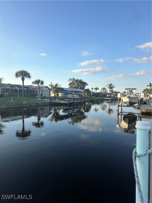 property view of water featuring a boat dock