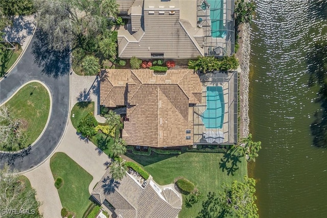 birds eye view of property featuring a water view