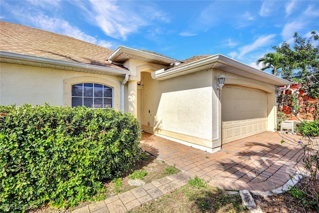 exterior space featuring a garage