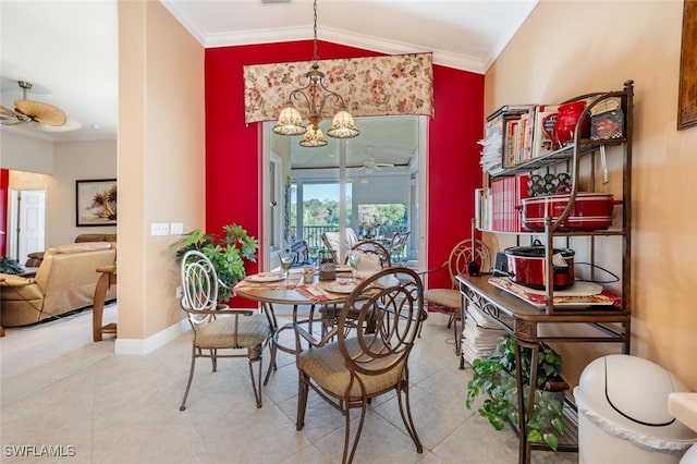 dining room featuring lofted ceiling, baseboards, crown molding, and ceiling fan with notable chandelier