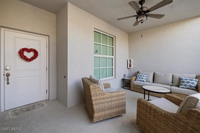 exterior space with an outdoor hangout area and ceiling fan