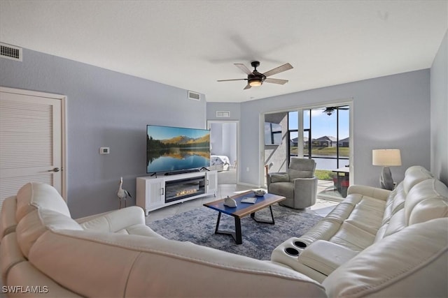 living room featuring ceiling fan