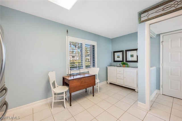 bathroom with tile patterned floors