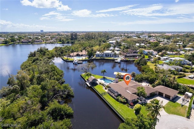 bird's eye view featuring a residential view and a water view