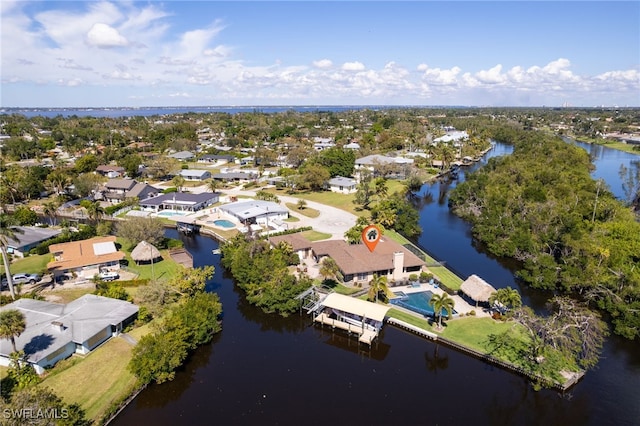 bird's eye view featuring a residential view and a water view