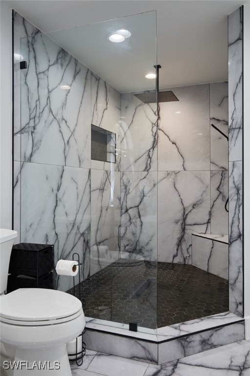 full bathroom with marble finish floor, stone wall, a marble finish shower, and toilet