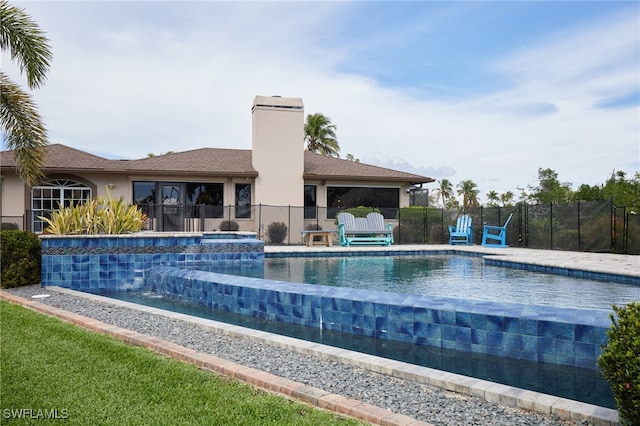 view of pool with fence and a fenced in pool