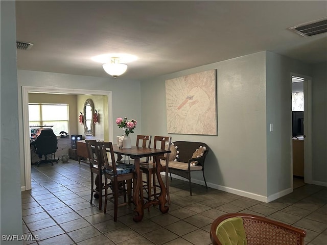 view of tiled dining space