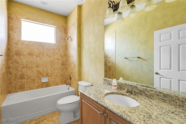 full bathroom with tiled shower / bath combo, vanity, and toilet