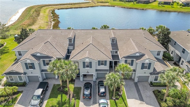 birds eye view of property featuring a water view