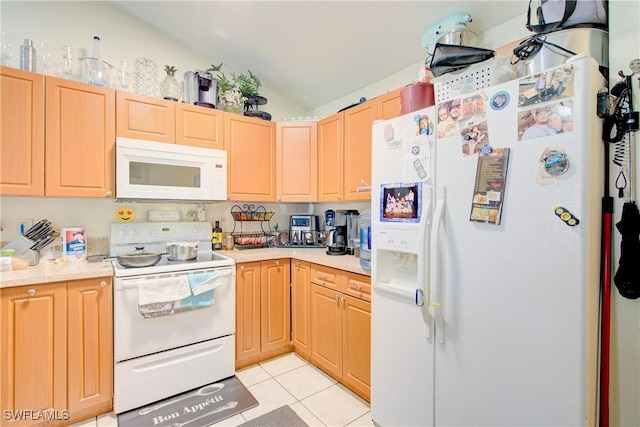 kitchen with light tile patterned flooring, white appliances, lofted ceiling, and light brown cabinets