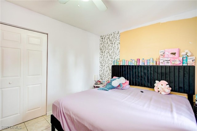 bedroom featuring ceiling fan and light tile patterned floors