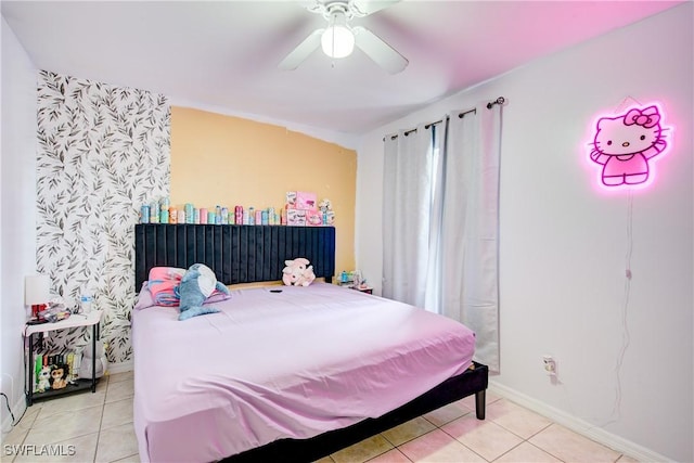 bedroom featuring light tile patterned floors and ceiling fan