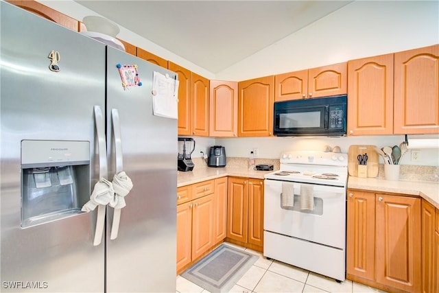 kitchen featuring lofted ceiling, white electric range, stainless steel fridge with ice dispenser, and light tile patterned floors