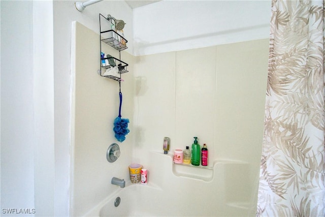 bathroom featuring shower / bath combination with curtain