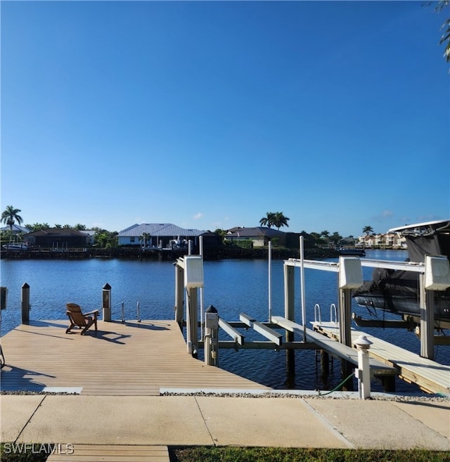 dock area featuring a water view