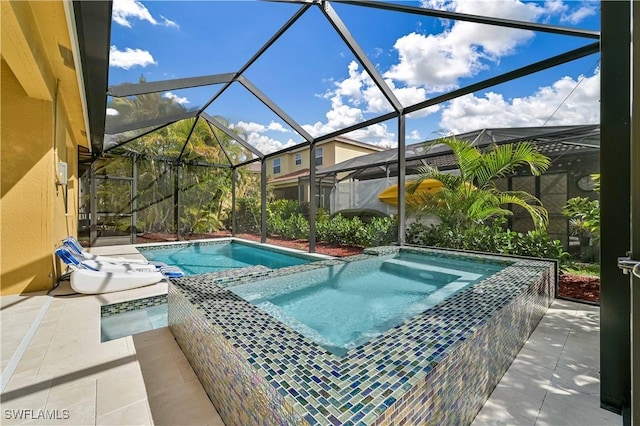 view of swimming pool with an in ground hot tub, glass enclosure, and a patio