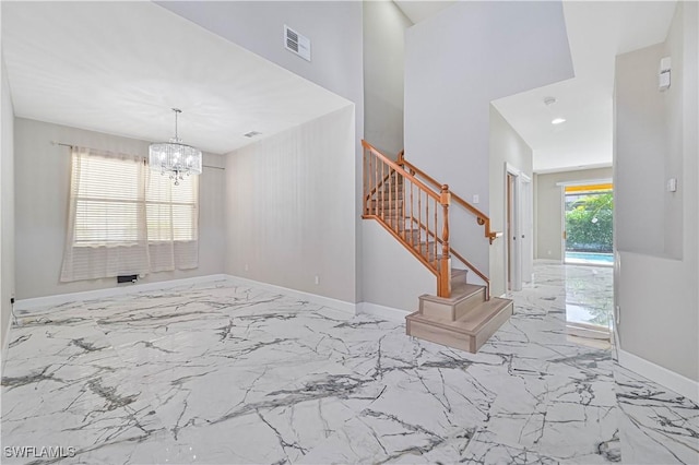 interior space featuring an inviting chandelier