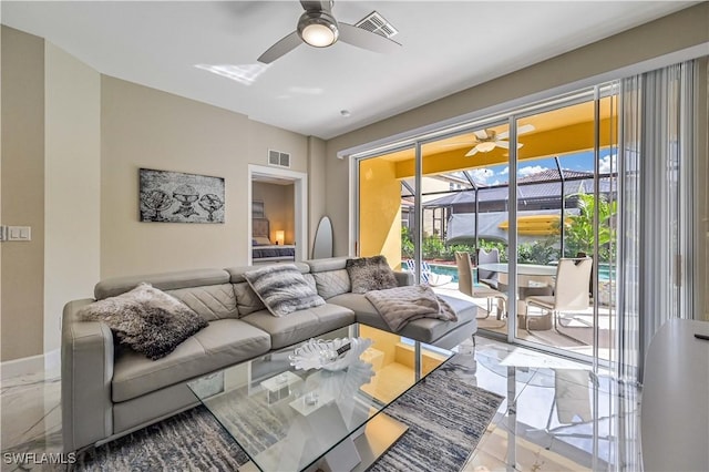 living room featuring ceiling fan